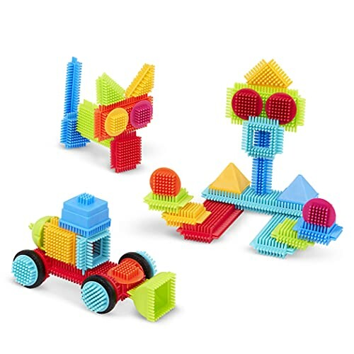 Kleurrijke plastic bouwspeelgoed set met verschillende vormen en structuren