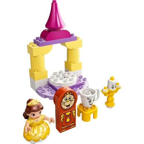 Lego-set van Belle met kasteel, klok, kopje en kandelaar.