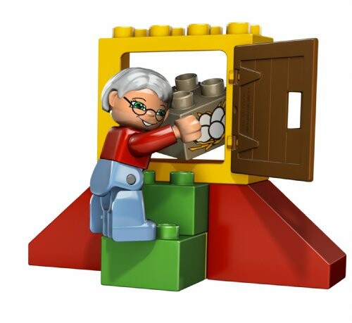 Lego-figuur bouwt met blokken