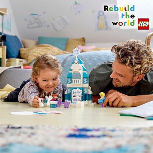 Kind en volwassene spelen met LEGO set