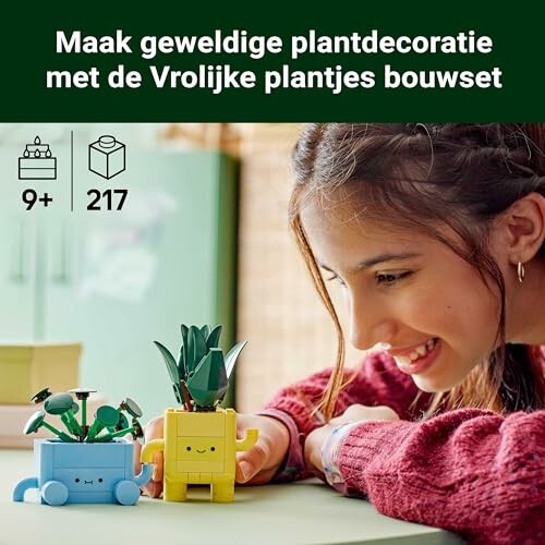 Kind speelt met vrolijke plantjes bouwset.