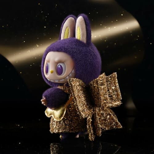 Paarse konijnenfiguur met gouden strik en glitter