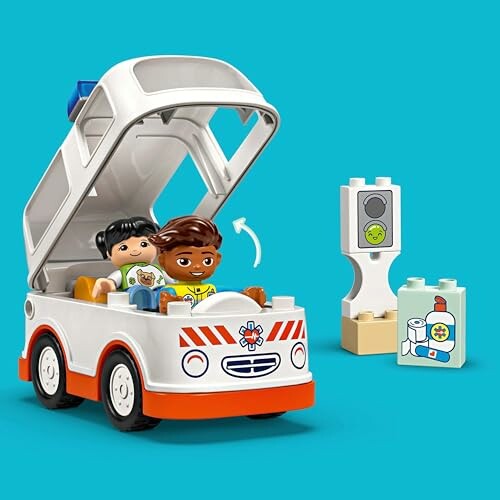 Speelgoedambulance met figuren en accessoires.