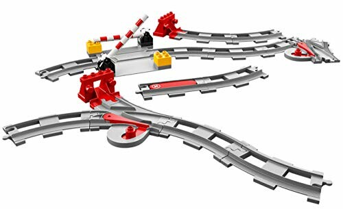 Speelgoed treinrails set met wissels en spoorbomen.
